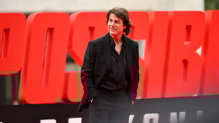 Image for Tom Cruise Sets Guinness World Record for Burning Parachute Jumps