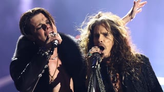 Image for Ozzy Osbourne VMAs Tribute: Steven Tyler, Joe Perry, and Yungblud Bark at the Moon Person