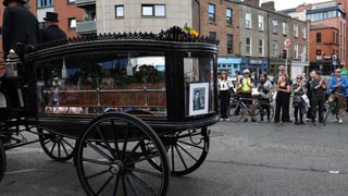 Image for U2 Share Rewritten &#8216;Beautiful Day&#8217; Lyrics From Glen Hansard&#8217;s Funeral