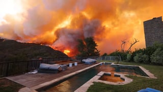 Image for Fire Rages Across Pacific Palisades as Thousands Evacuate