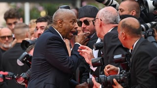 Image for Denzel Washington Appears to Fight Back Against Pushy Cannes Photographer and Yells ‘Stop!’ During Tense Red Carpet Moment