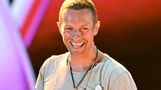 Image for Coldplay Frontman Chris Martin Jokes About Viral Kiss Cam Moment During Concert: ‘We’d Like to Say Hello to Some of You in the Crowd’
